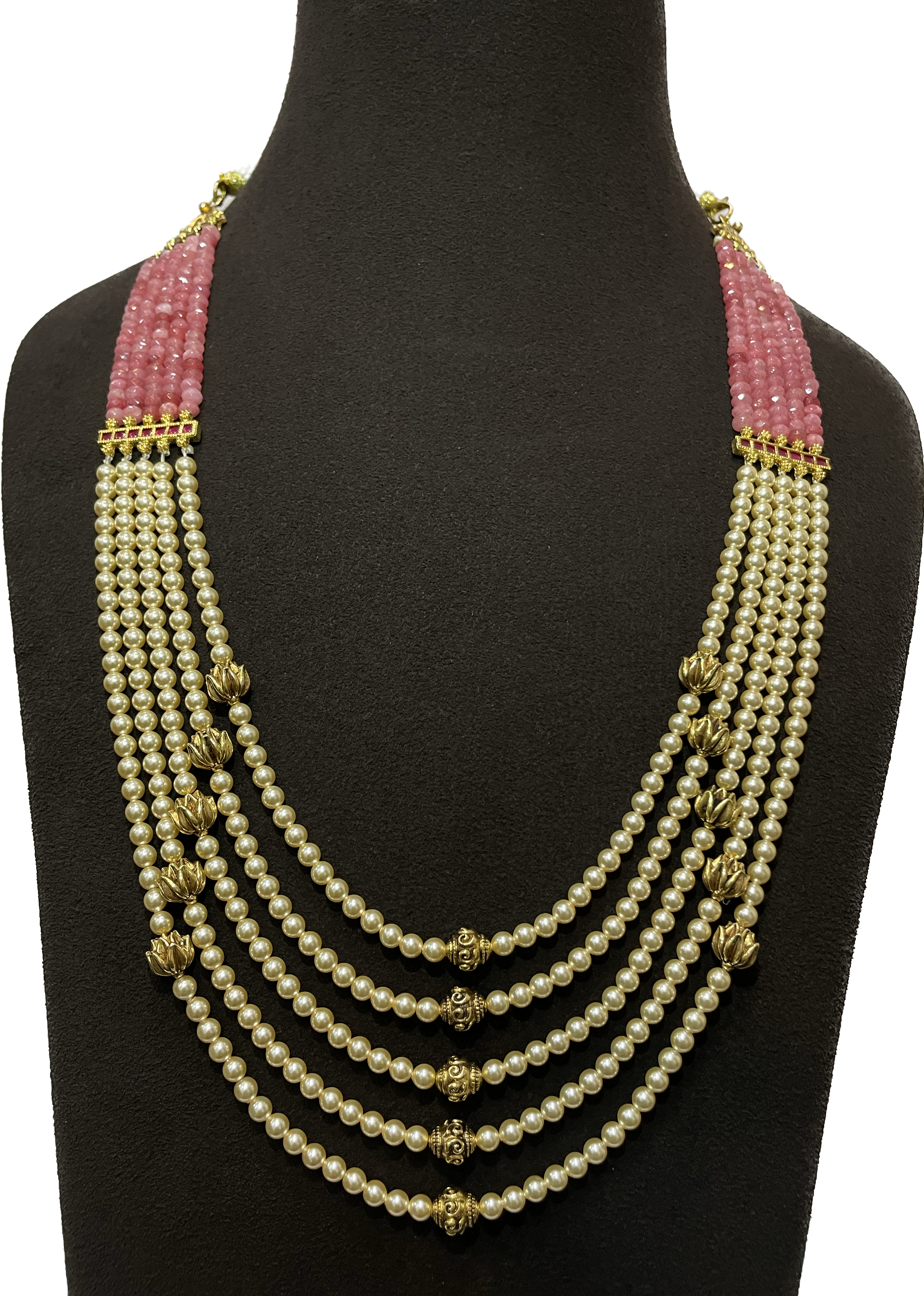 A layered necklace with pink and cream-coloured beads.